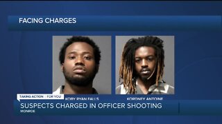 Monroe officer shot in line of duty in stable condition; suspects face a combined 30 charges