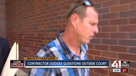 Concrete contractor facing felony charges confronted outside court