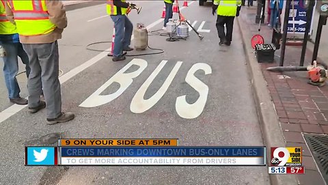 Crews marking Downtown bus-only lanes