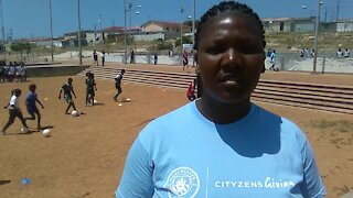 Man City coaches in Khayelitsha (kNe)