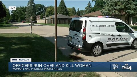 Officers run over and kill woman lying in street