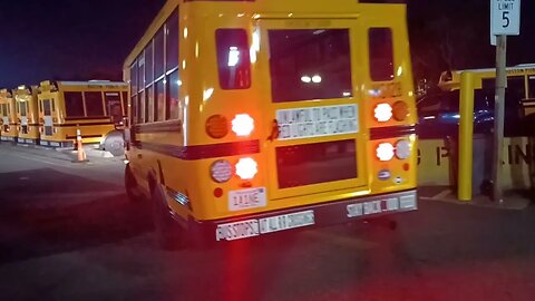 Boston Public School buses waiting in line to refuel propane