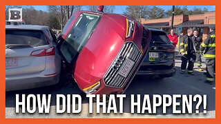 How Did That Happen? Audi Ends Up Wedged Between Parked Cars