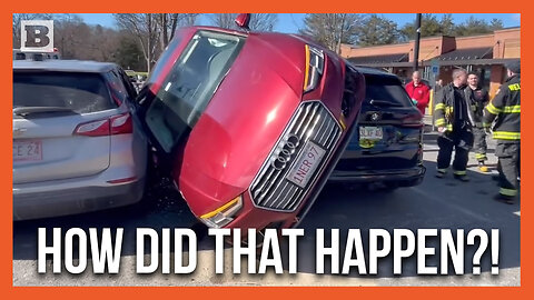 How Did That Happen? Audi Ends Up Wedged Between Parked Cars