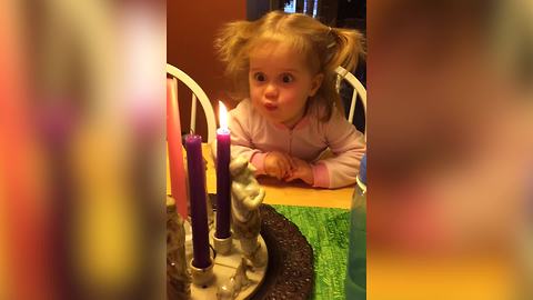 Tot Girl Howls When Blowing A Candle