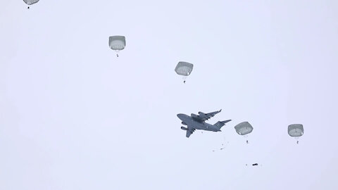 Spartan paratroopers jump into winter snow