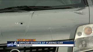 Shorewood police officer fired at a car that hit squad