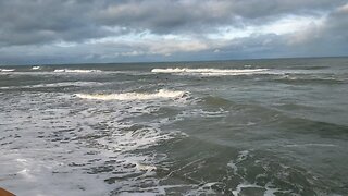 Surfers at Flagler beach.