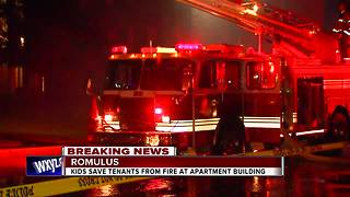 Two kids rush to save people from burning Romulus apartment