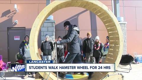 Kids walk life-size hamster wheel to raise money for impoverished families