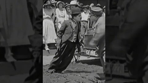 Charlie Chaplin's Hilarious Traffic Tango: The Signal Standoff!