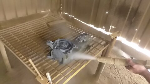 Sandblasting a motor case