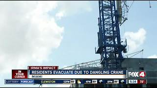 Miami police and fire crews evacuating residents living near collapsed crane, following Hurricane Irma