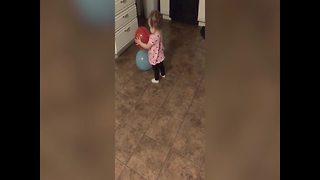Tot Girl Having Fun With Balloons