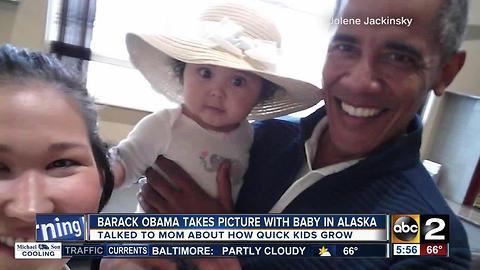 Picture of Barack Obama holding baby goes viral