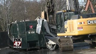 Old Sam's Club gas station comes down