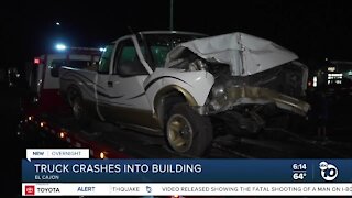 Driver jumps out just before truck slams into El Cajon building