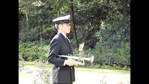 Japanese Sailor playing the bugle at the 2021 Hodogaya Cemetery