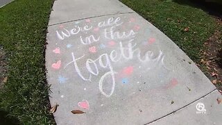 Jupiter kids decorate sidewalks with positive messages