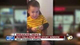 Boy falls from second story window
