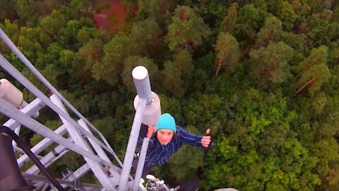 Climbing insanely tall cell tower to the top