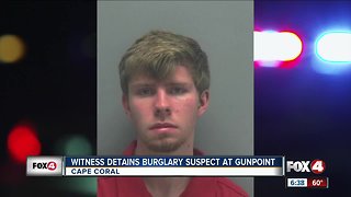 Homeowner holds suspect at gunpoint