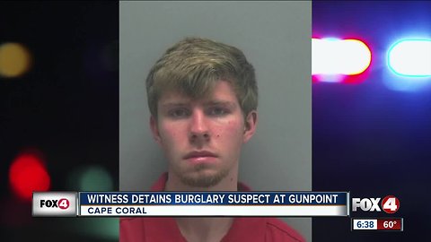 Homeowner holds suspect at gunpoint