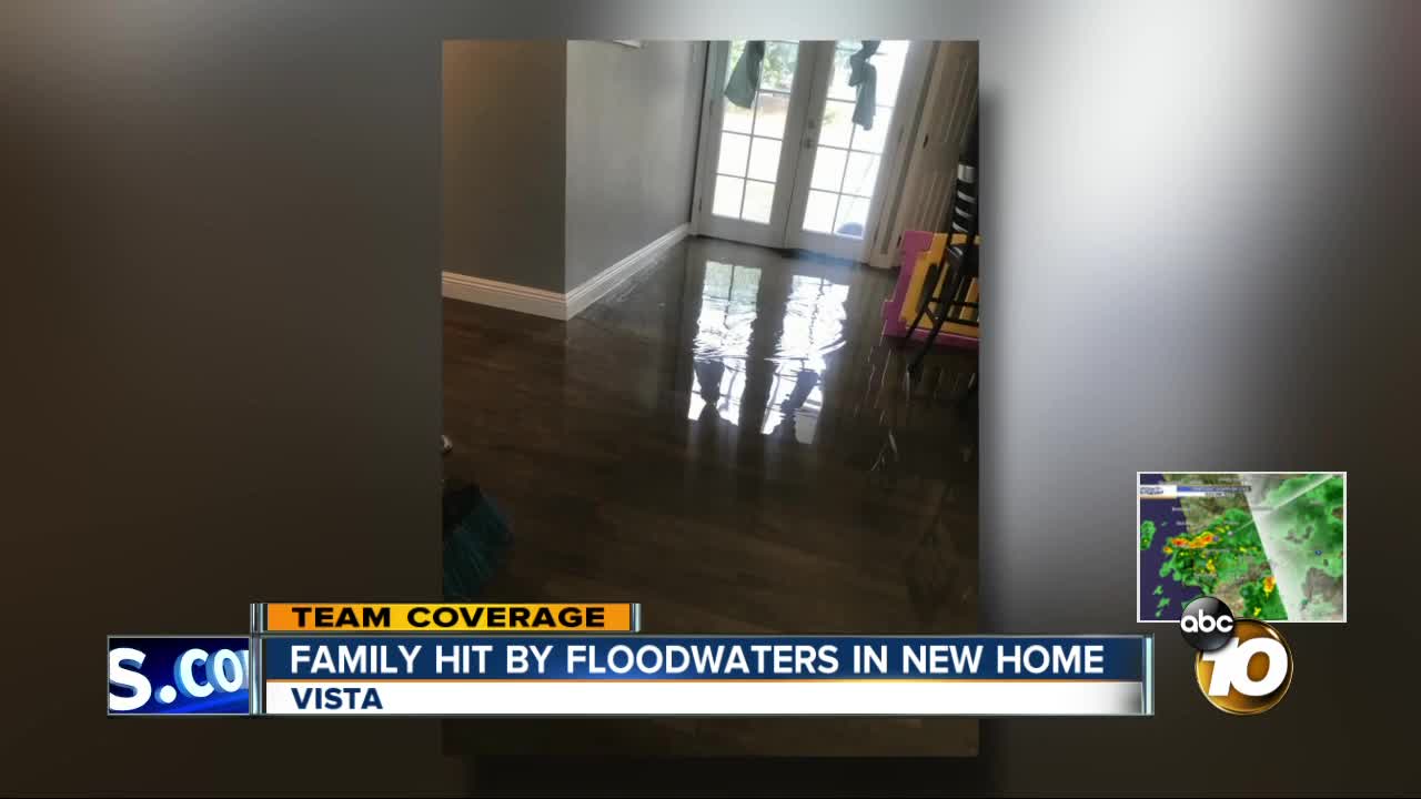 Family hit by floodwaters in new home