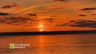 Vibrant, beautiful colours light up the sky during sunrise