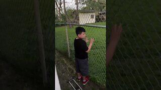 Boy Yells to Neighbor for His Ball