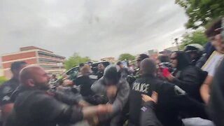 Police unsuccessfully hold back Muslim men from fighting AntiFa protecting Pride Grooming at Schools
