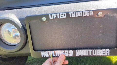 Lifted Thunder: Custom Made Stainless Steel License Plate Frame Auto Car Accessory