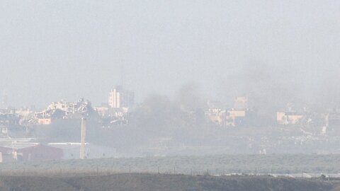 Smoke billows over northern Gaza, seen from Israeli border