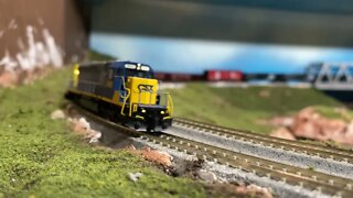 N Scale CSX train rolling down a hill