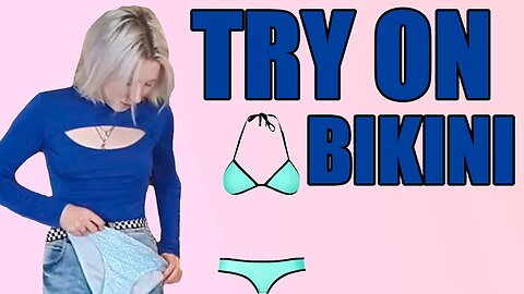 Beach fashion: Trying on a variety of swimsuits