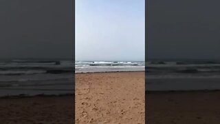 Listening to the waves on the beach