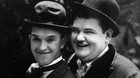 Oliver Hardy with Stan Laurel and his daughter Lois in silent home movies