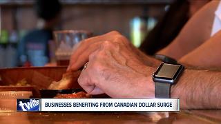 Local businesses see boom under improved Canadian dollar