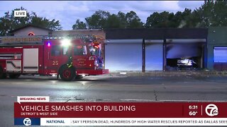 Vehicle smashes into building