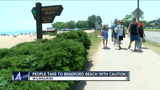 Beachgoers cautiously return to Bradford after shooting