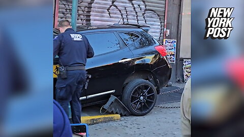 Man arrested after driving SUV into NYC subway station entrance