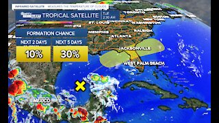 Tropical disturbance to move across Florida, Larry still a major hurricane