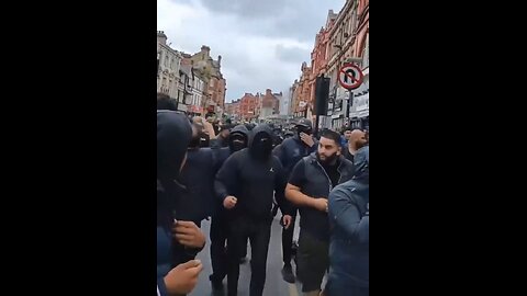 Huge mob descend on Bolton City Centre - looks like they are baying for blood