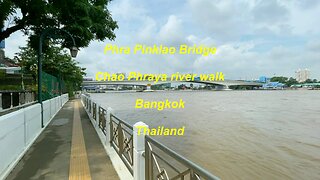 Phra Pinklao Bridge Chao Phraya river walk in Bangkok Thailand