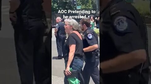 AOC Pretending to be arrested at abortion "rights" protest.