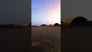 Kayaking under a galaxy sky