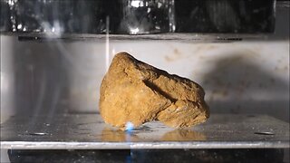 Lava Bubbles Turned to Crystals In Hydraulic Press