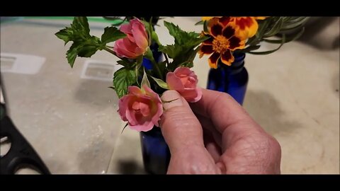 Mini vases, mini roses, and a cannon blast!