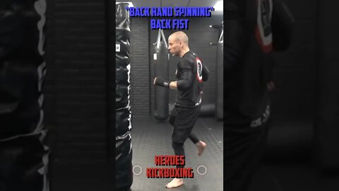 Heroes Training Center | Kickboxing & MMA "How To Throw A Back Hand Spinning Back Fist" | #Shorts