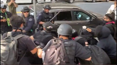 Police Beat Back Antifa After They Hurled Projectiles At Cops